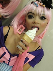 Thai Emo chick flashes her pussy and tits while licking an ice cream cone